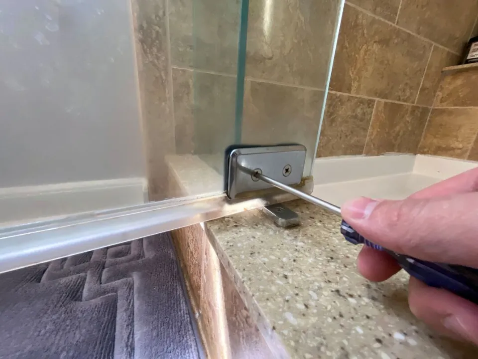 How to Remove Shower Doors and Patch the Holes Left in the Tile?