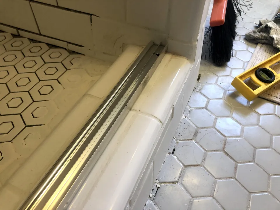How to Remove Shower Doors and Patch the Holes Left in the Tile?